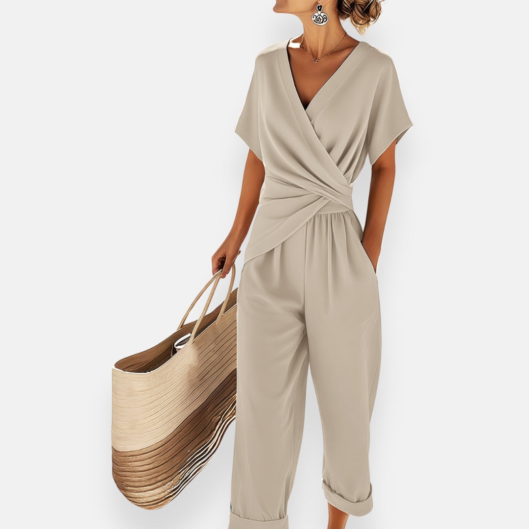 Damjumpsuit med V-ringning och vid bensiluett