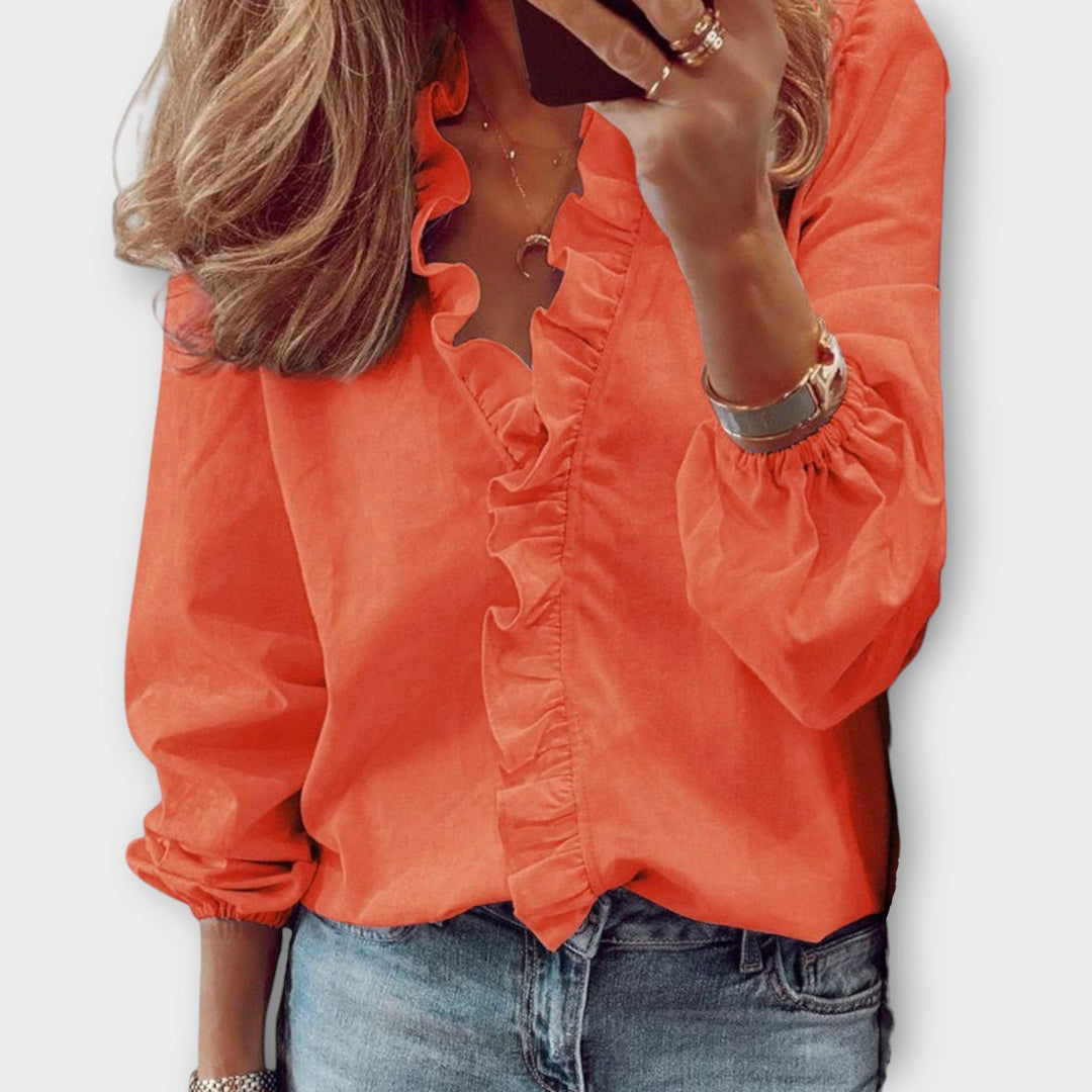 Femininitet och Elegans: V-ringad Blus med Volanger