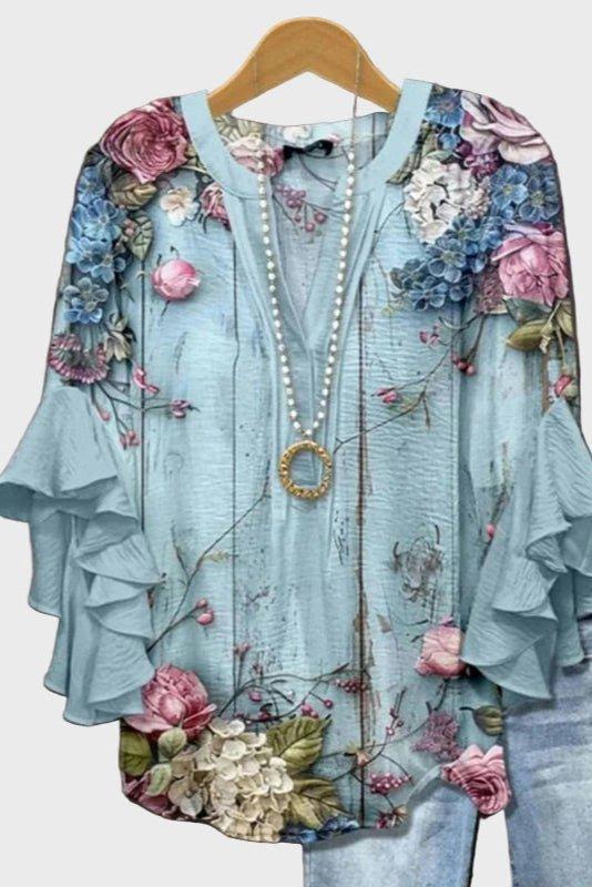 Romantisk blus med blommigt tryck och volangärm – Elegant stil