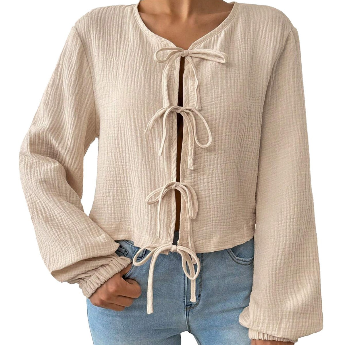 Elegant croppad blus med unika snörningar