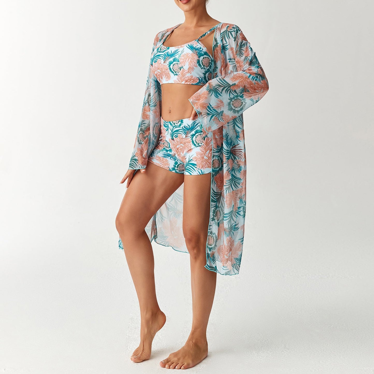 Elegant Badset för Damer med Blommigt Top och Transparent Kaftan
