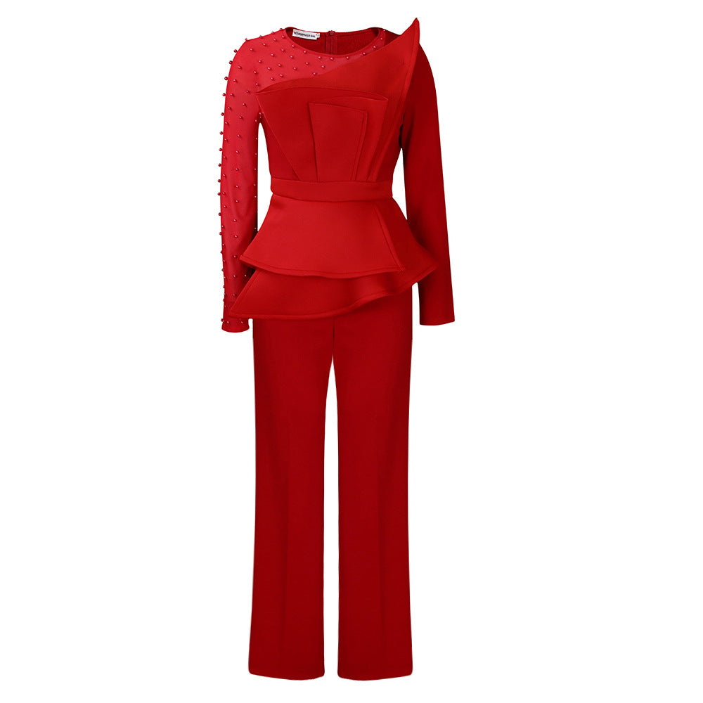 Modern Jumpsuit med Asymmetrisk Skärning och Glamourdetaljer