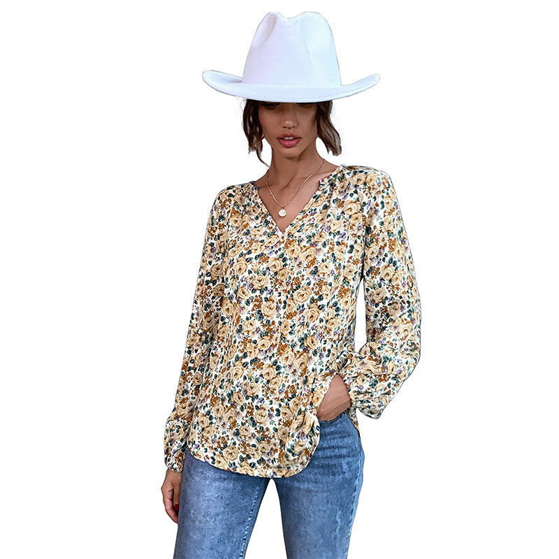 Feminine Bluse med Blomsterprint og Elegant Rynkning