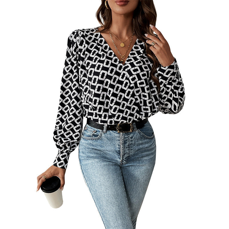 Geometrisk blus med eleganta puffärmar från StjerneMode