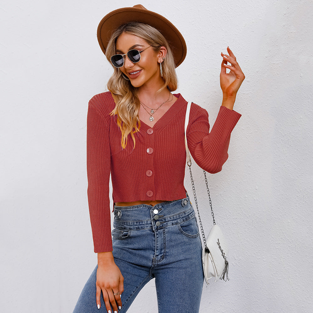 Stilfuld Cropped Strikjakke med Elegante Detaljer