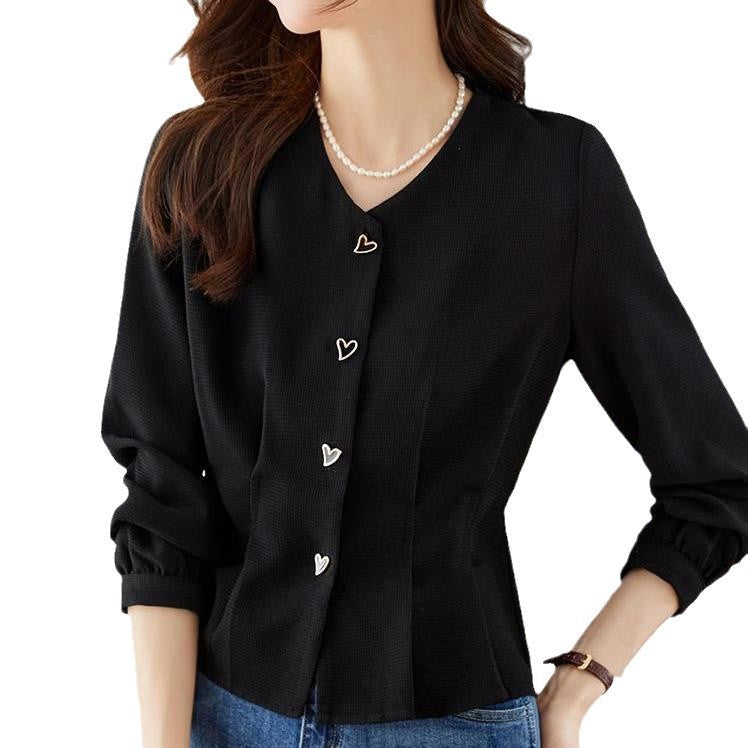 Feminine Bluse med Unikke Knapdetaljer og Fjerlette Ærmer