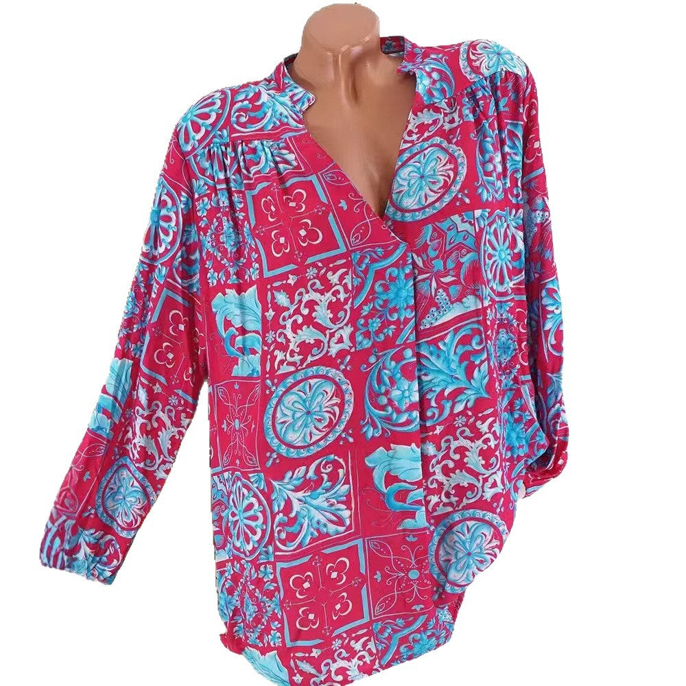 Feminin blus med blomstertryck och lös passform
