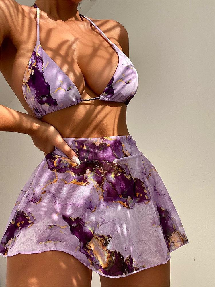 Sofistikerad Bikiniset med Elegant Sarong och Blommönster