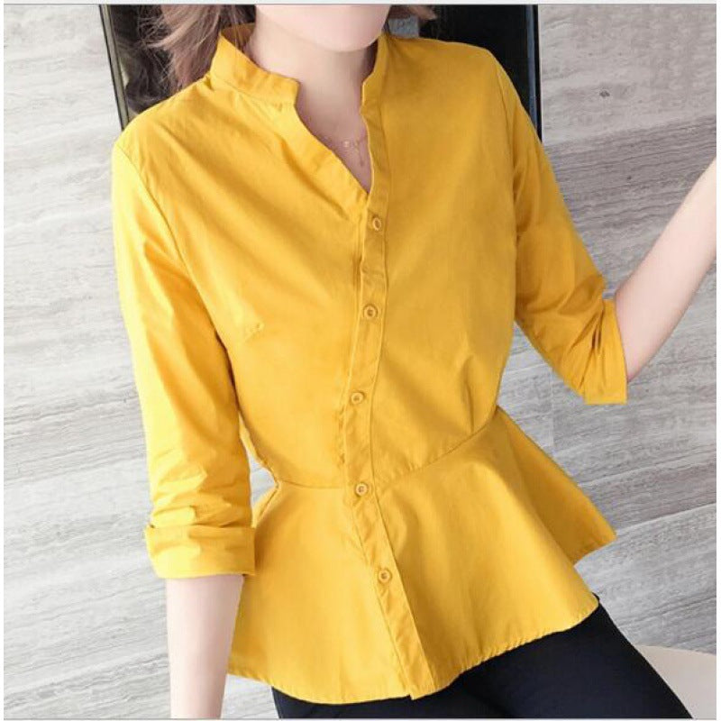 Klassisk bluse med peplum og moderne krave