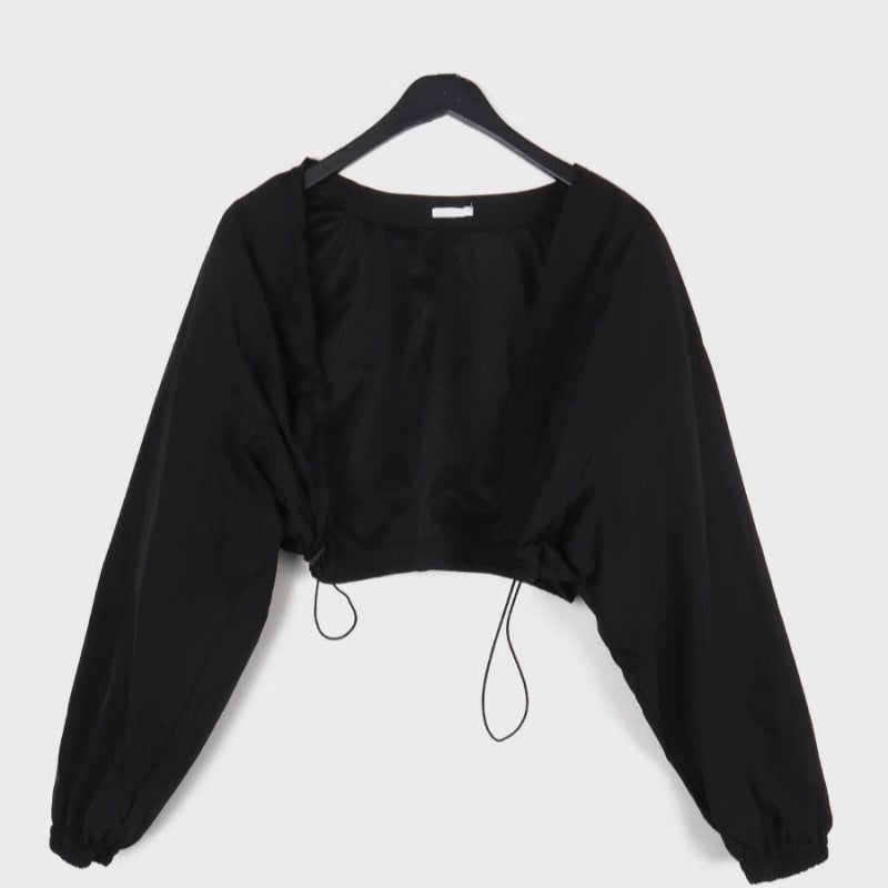 Elegant croppad blus med volanger för dam