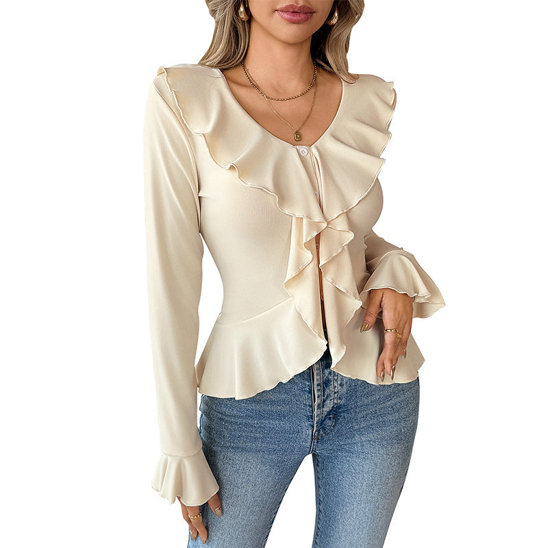 Feminin Blus med Rynkade Detaljer och Elegant Silhuett