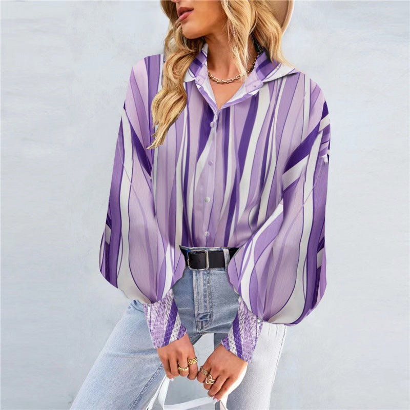 Feminin blus med voluminösa ärmar och unik design