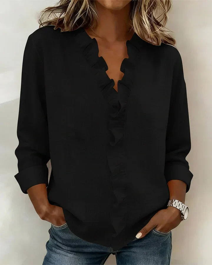Signe | Chic Blus med V-ringning och Vackra Volanger