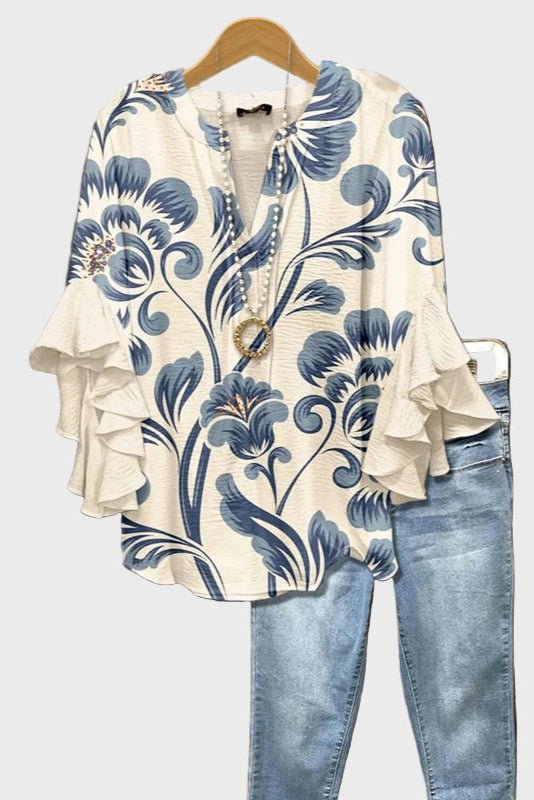 Elegant blus med volangärmar och unikt mönster