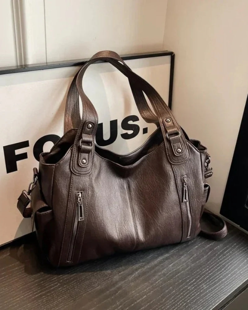 Dame- skuldertaske – rummelig og stilfuld med justerbar rem