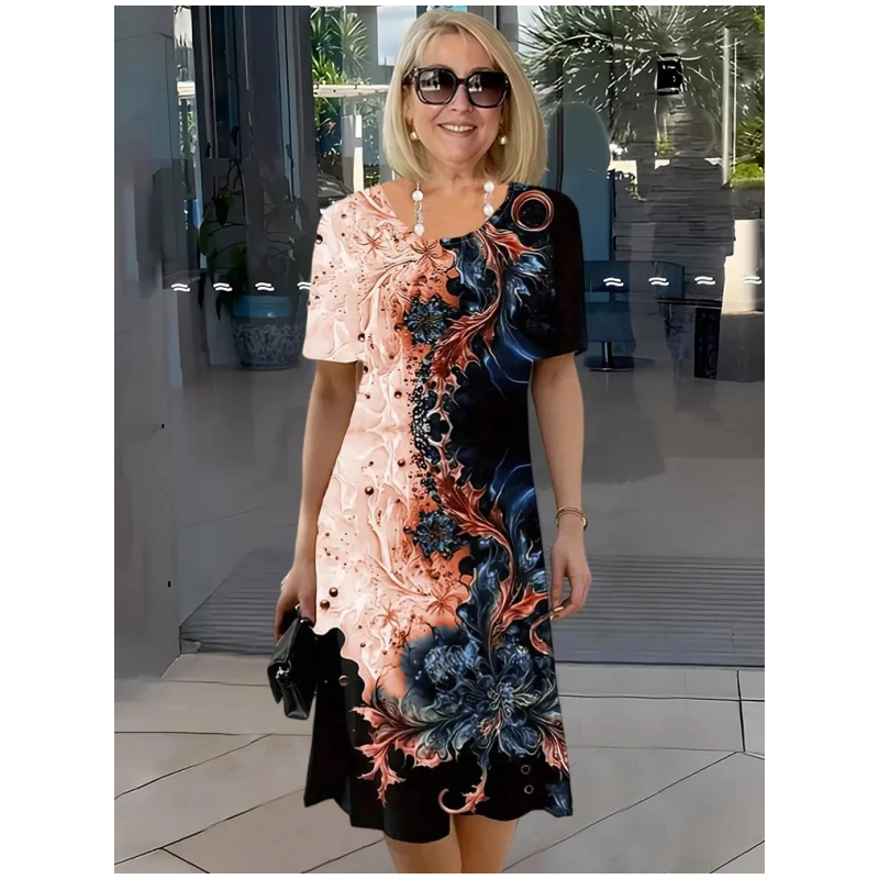 Mönstrad Midiklänning i Elegant Stil