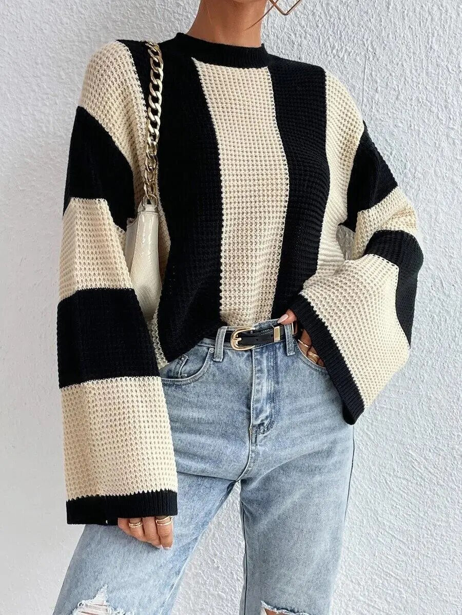 Elegant tofarvet strikpullover med luftige ærmer