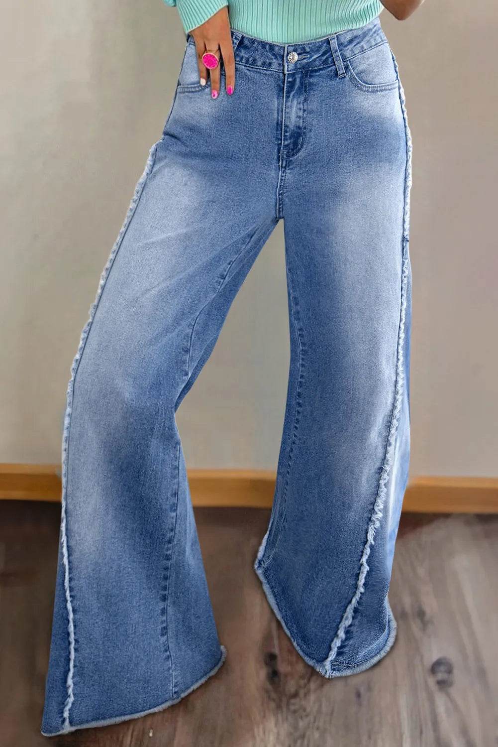 Moderne Denim Bukser med Ufer og Løse Ben