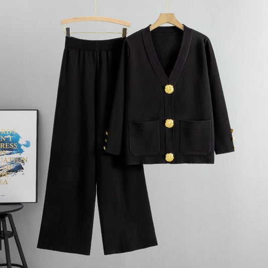 Elegant set med stickad tröja och lösa byxor