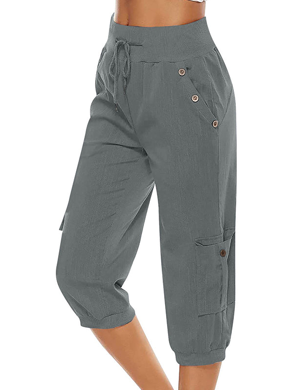 Moderne Capri Bukser med Chic Knapdetaljer og Fleksibel Talje
