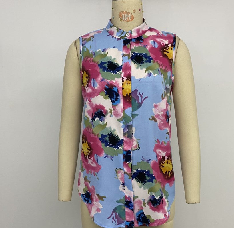 Snygg Ärmellös Blus med Blomsterprint och Elegant Knopplinje