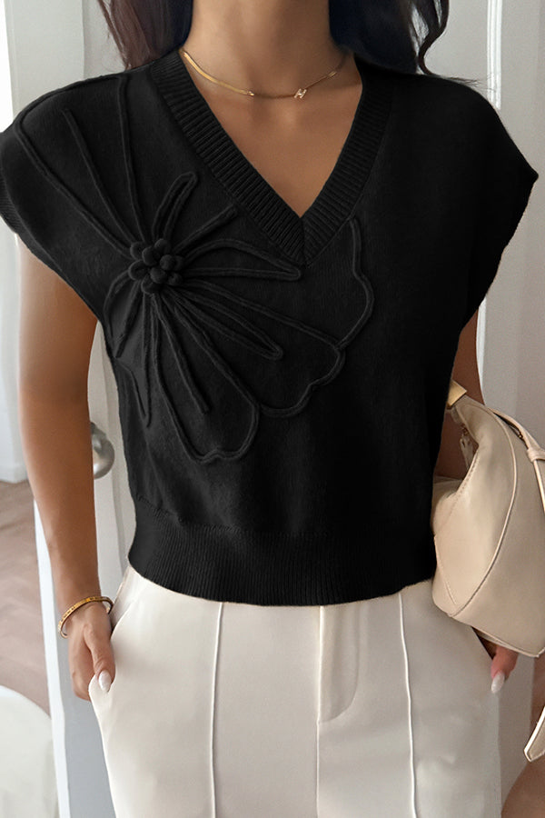 Elegant ærmeløs strikbluse med V-hals