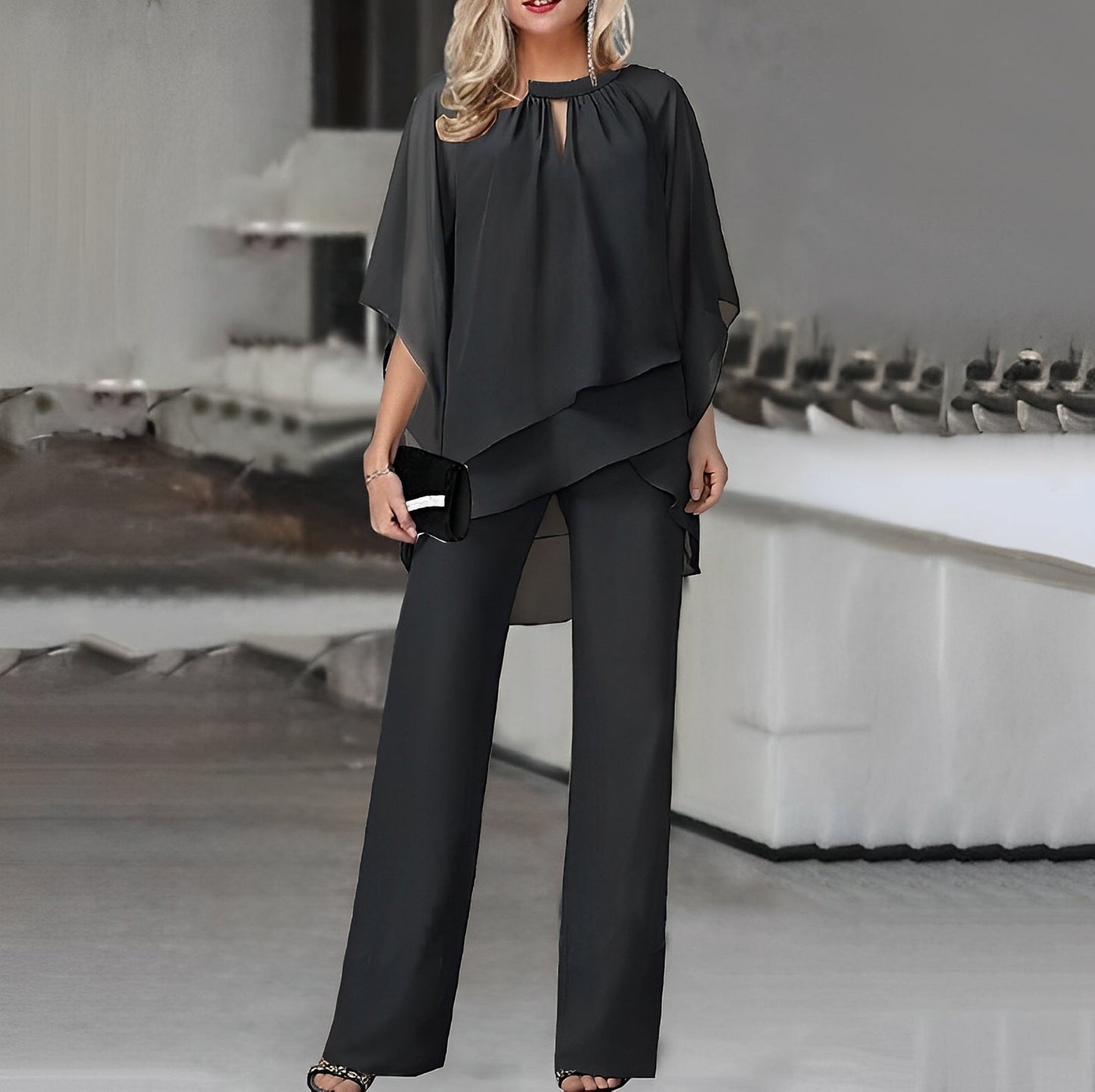Sofistikeret to-delt jumpsuit med unik overdel