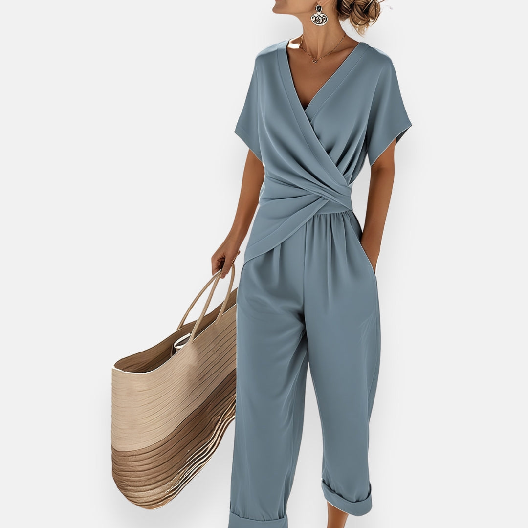 Damjumpsuit med V-ringning och vid bensiluett