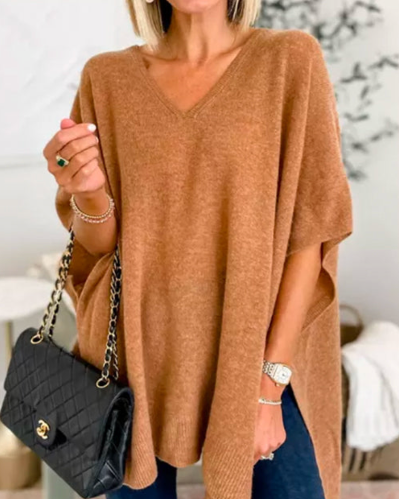 Loose Fit stickad poncho med V-ringning