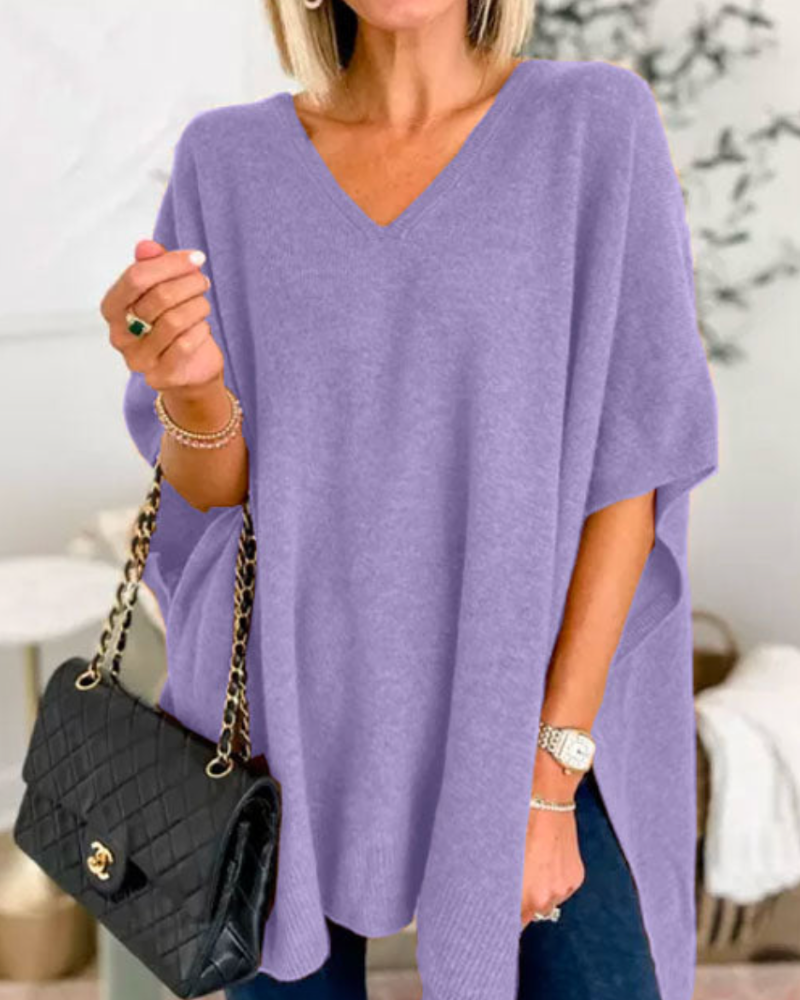 Loose Fit stickad poncho med V-ringning