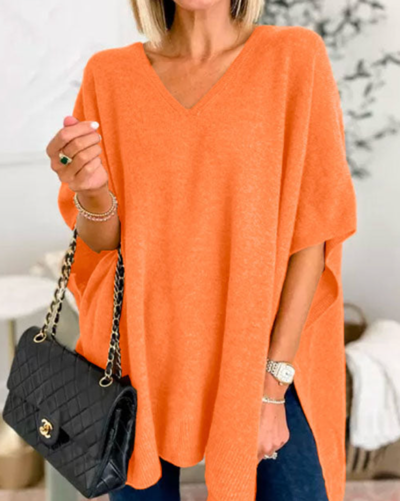 Loose Fit stickad poncho med V-ringning
