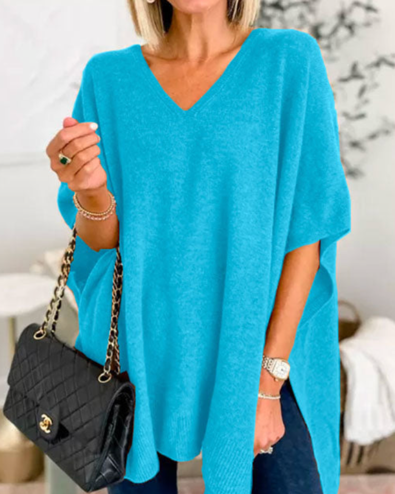 Loose Fit stickad poncho med V-ringning