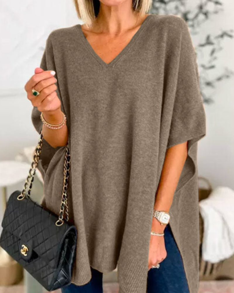 Loose Fit stickad poncho med V-ringning