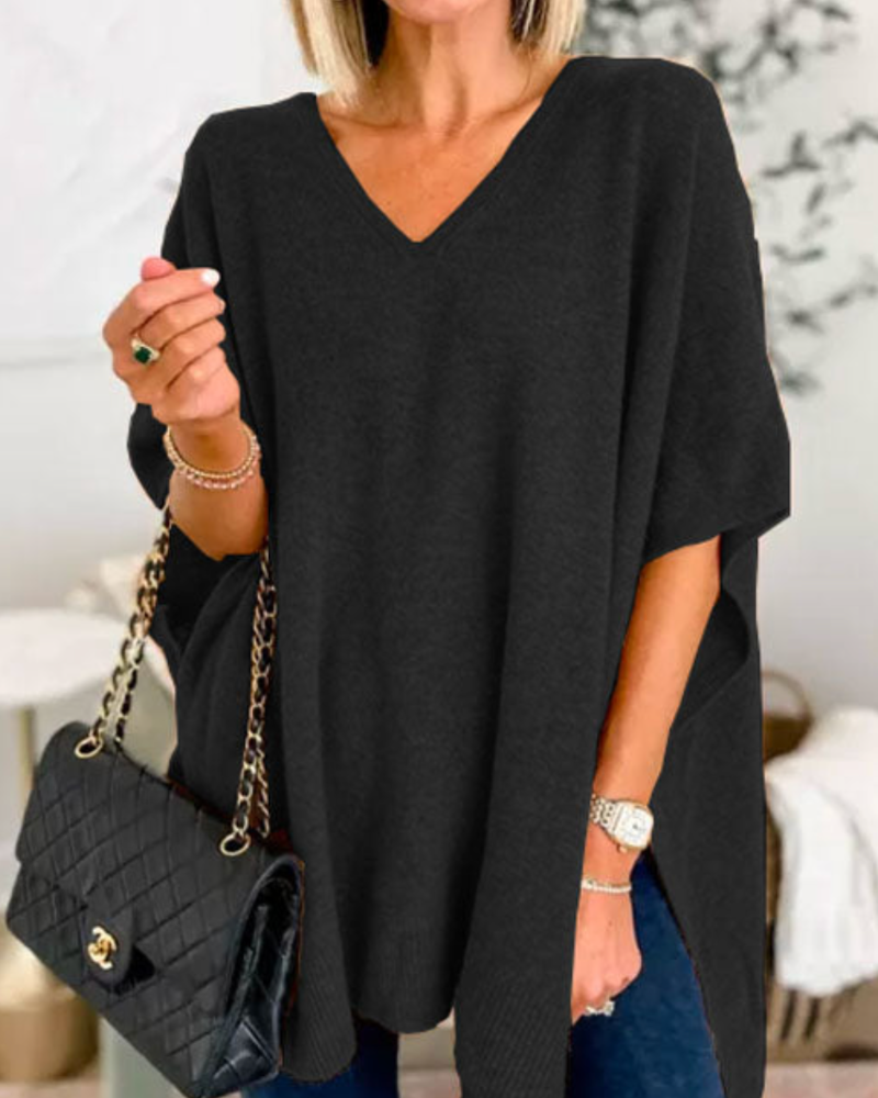 Loose Fit stickad poncho med V-ringning