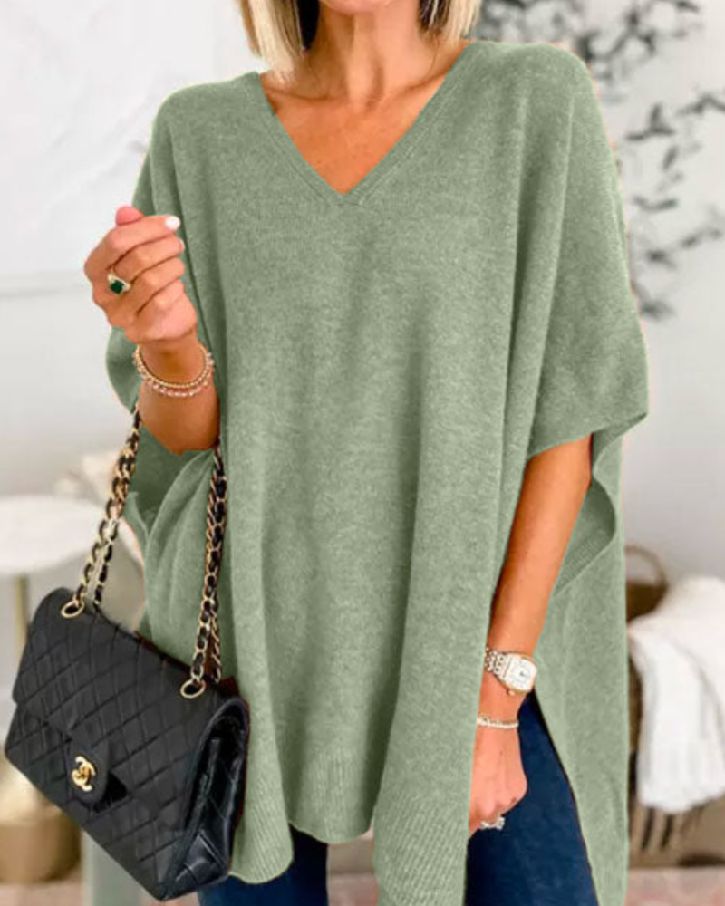 Loose Fit stickad poncho med V-ringning