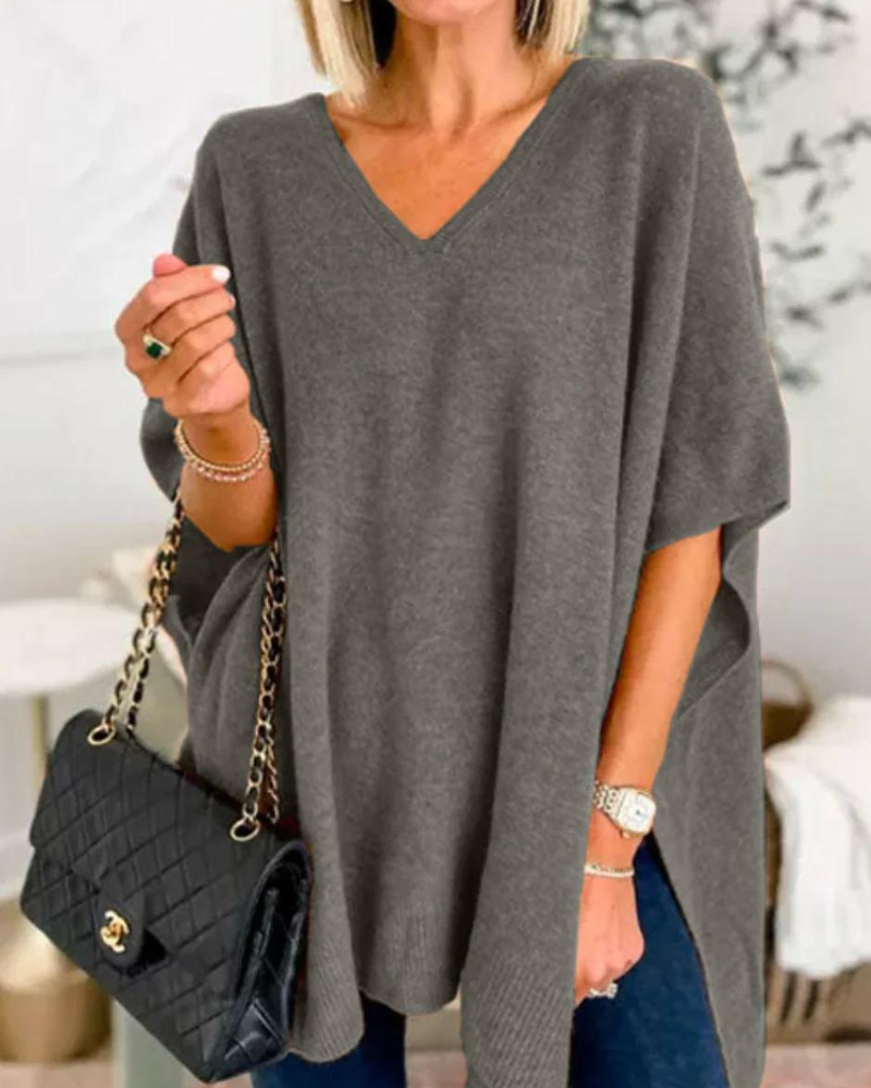 Loose Fit stickad poncho med V-ringning