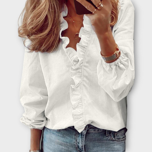 Femininitet och Elegans: V-ringad Blus med Volanger