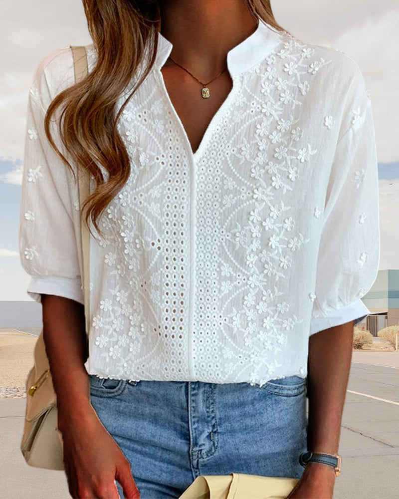 Evelina | Elegant sommarblus med V-ringning och puffärmar