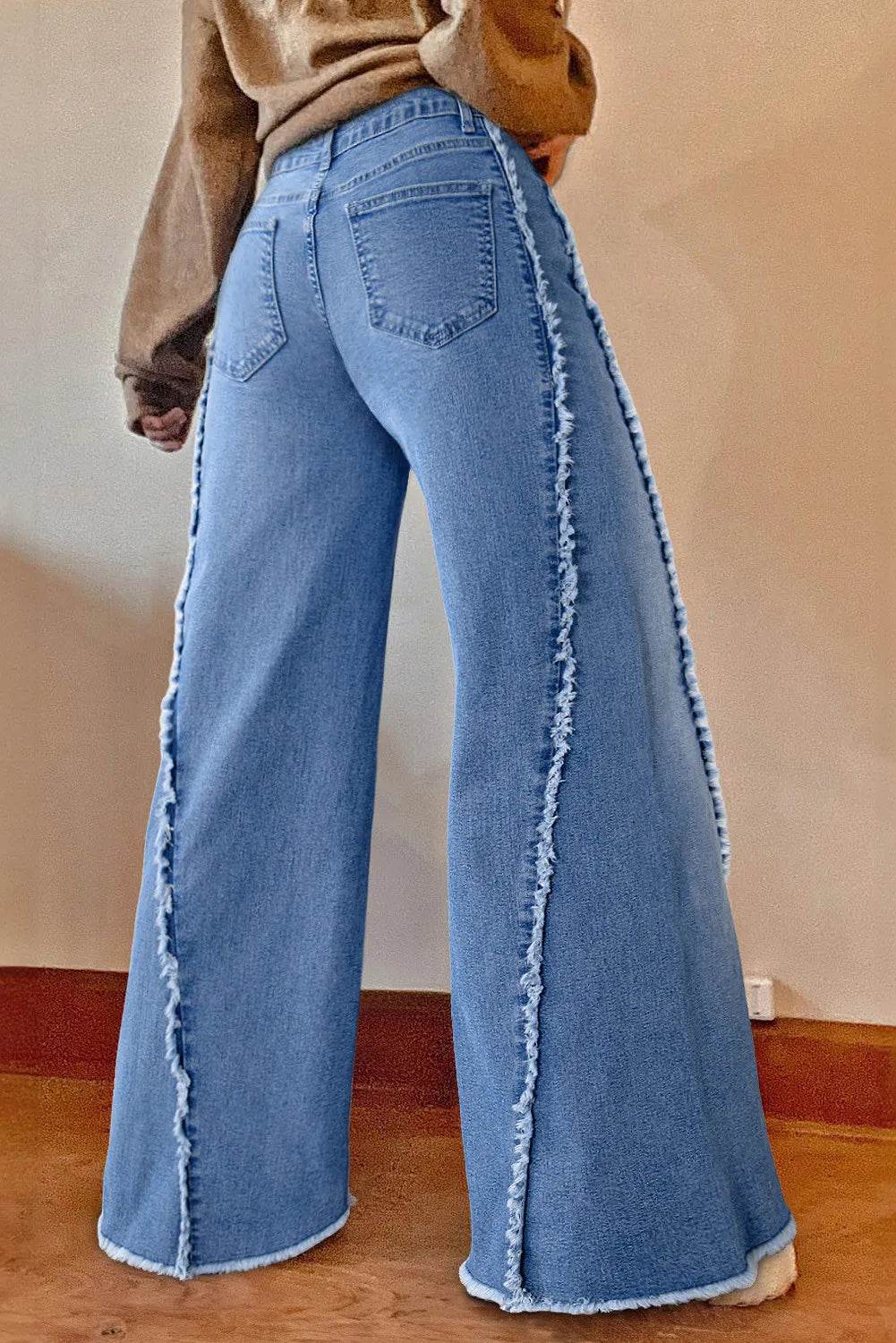 Moderne Denim Bukser med Ufer og Løse Ben