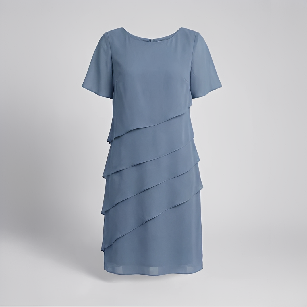 Elegant och figursydd klänning för den moderna kvinnan