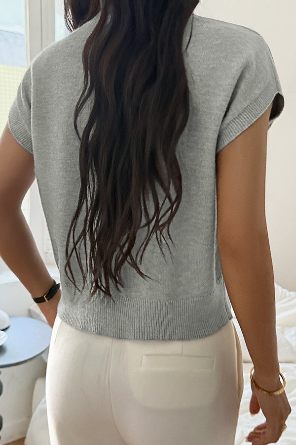 Elegant ærmeløs strikbluse med V-hals
