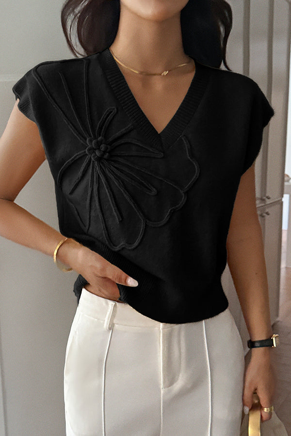 Elegant ærmeløs strikbluse med V-hals