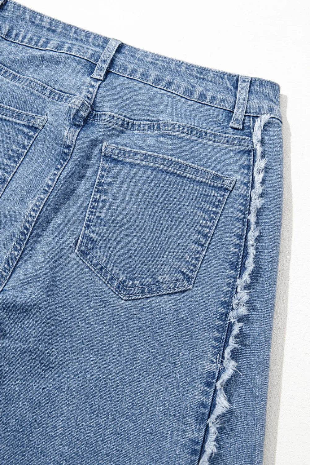 Moderne Denim Bukser med Ufer og Løse Ben