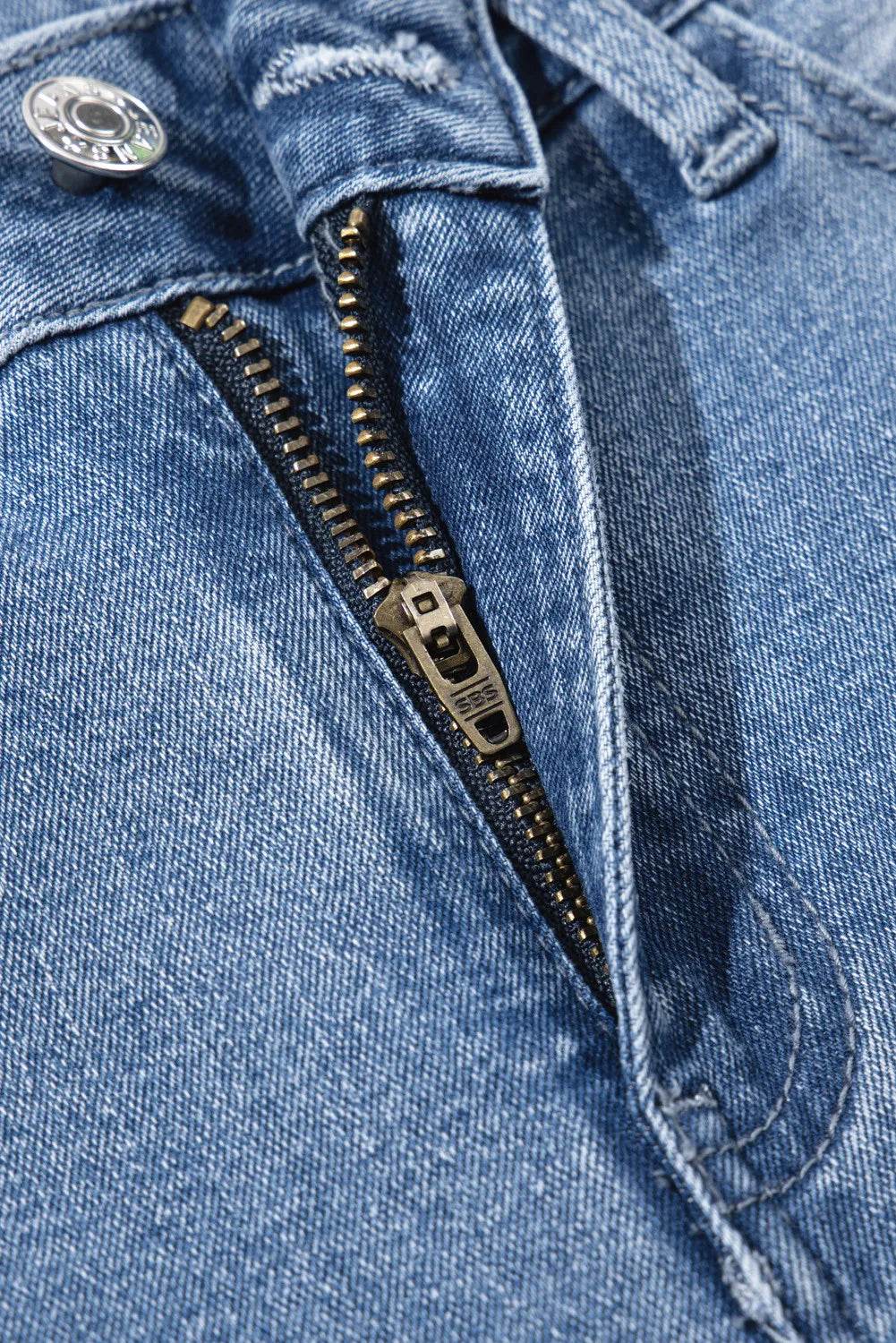 Moderne Denim Bukser med Ufer og Løse Ben