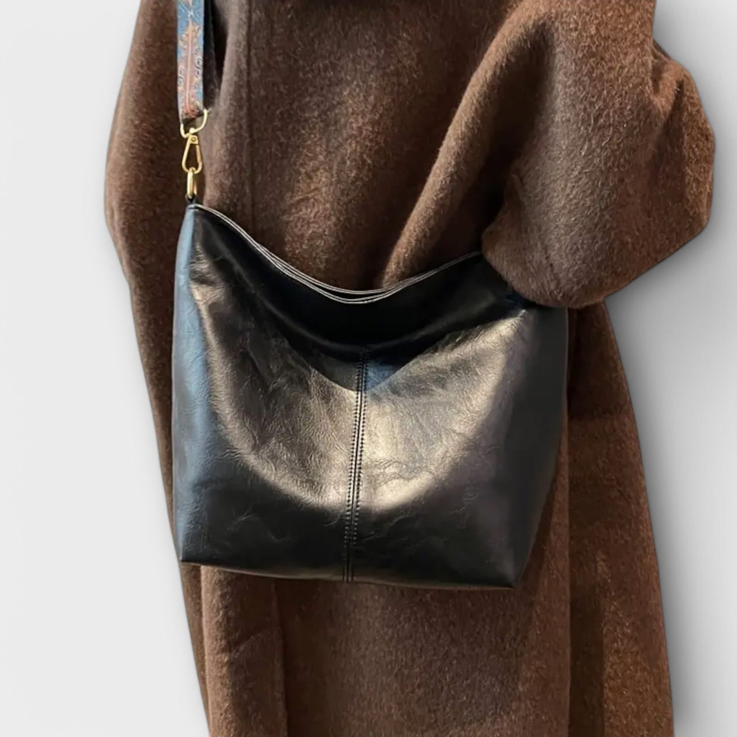 Florina | Elegant axelväska med unik remdesign