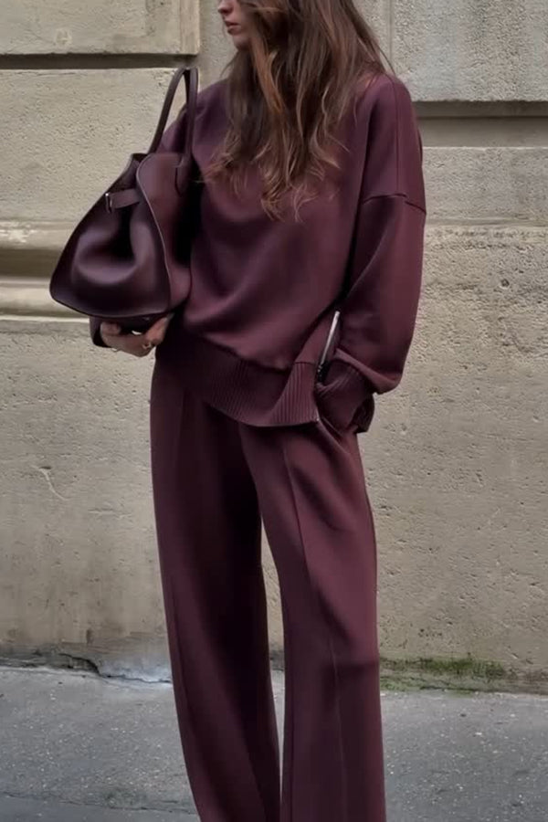 Elegant set med polotröja och lösa byxor med fickor