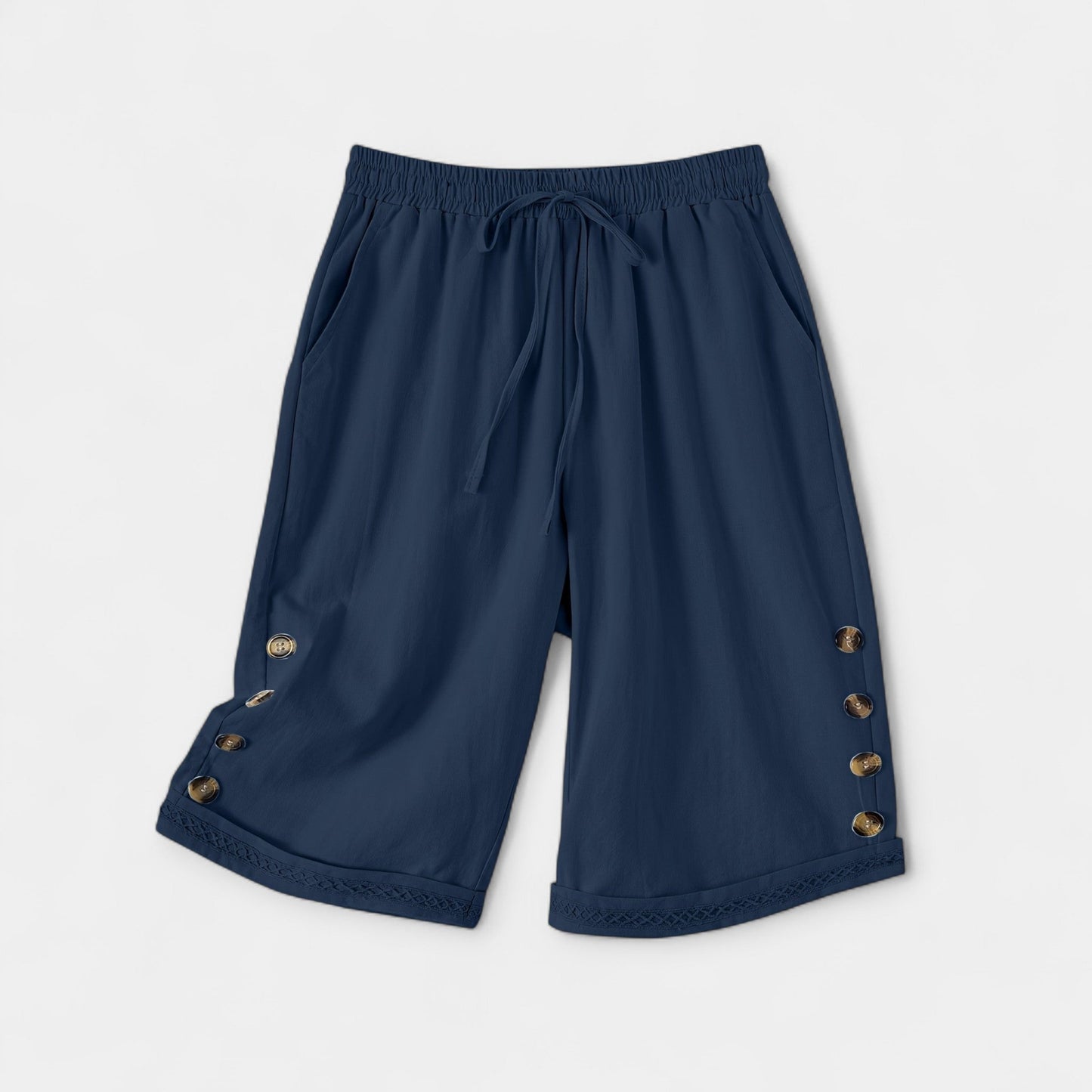 Stilfulde Knælange Shorts med Unikke Knapdetaljer