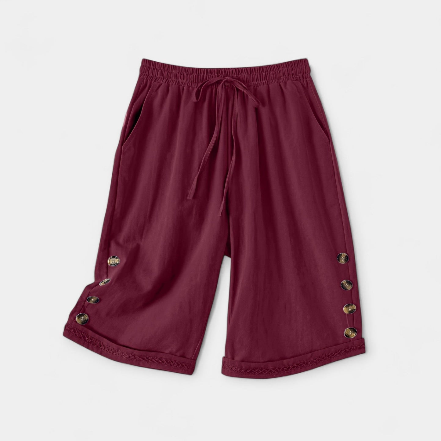 Stilfulde Knælange Shorts med Unikke Knapdetaljer