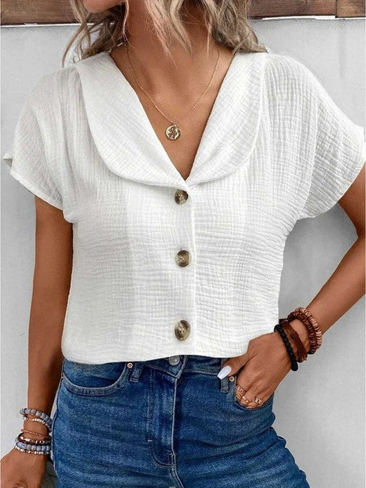 Chic blus med krage och knappar