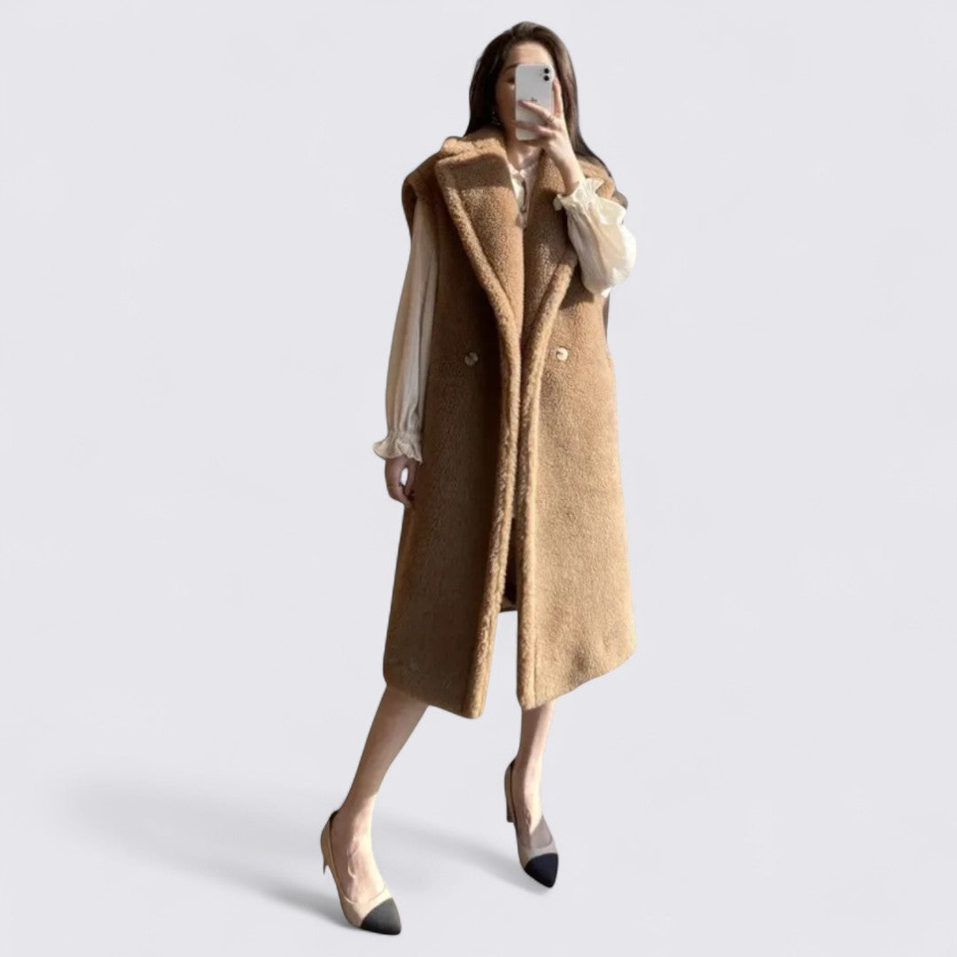 Damefrakke med revers – ærmeløs frakke – lang skåret